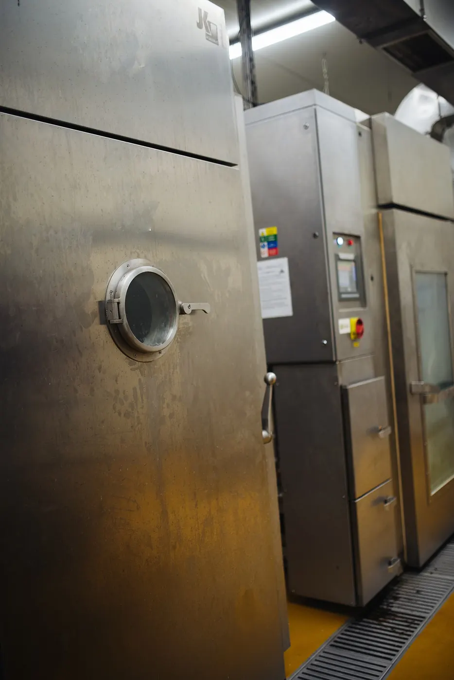 Commercial kitchen equipment laid out in a working space