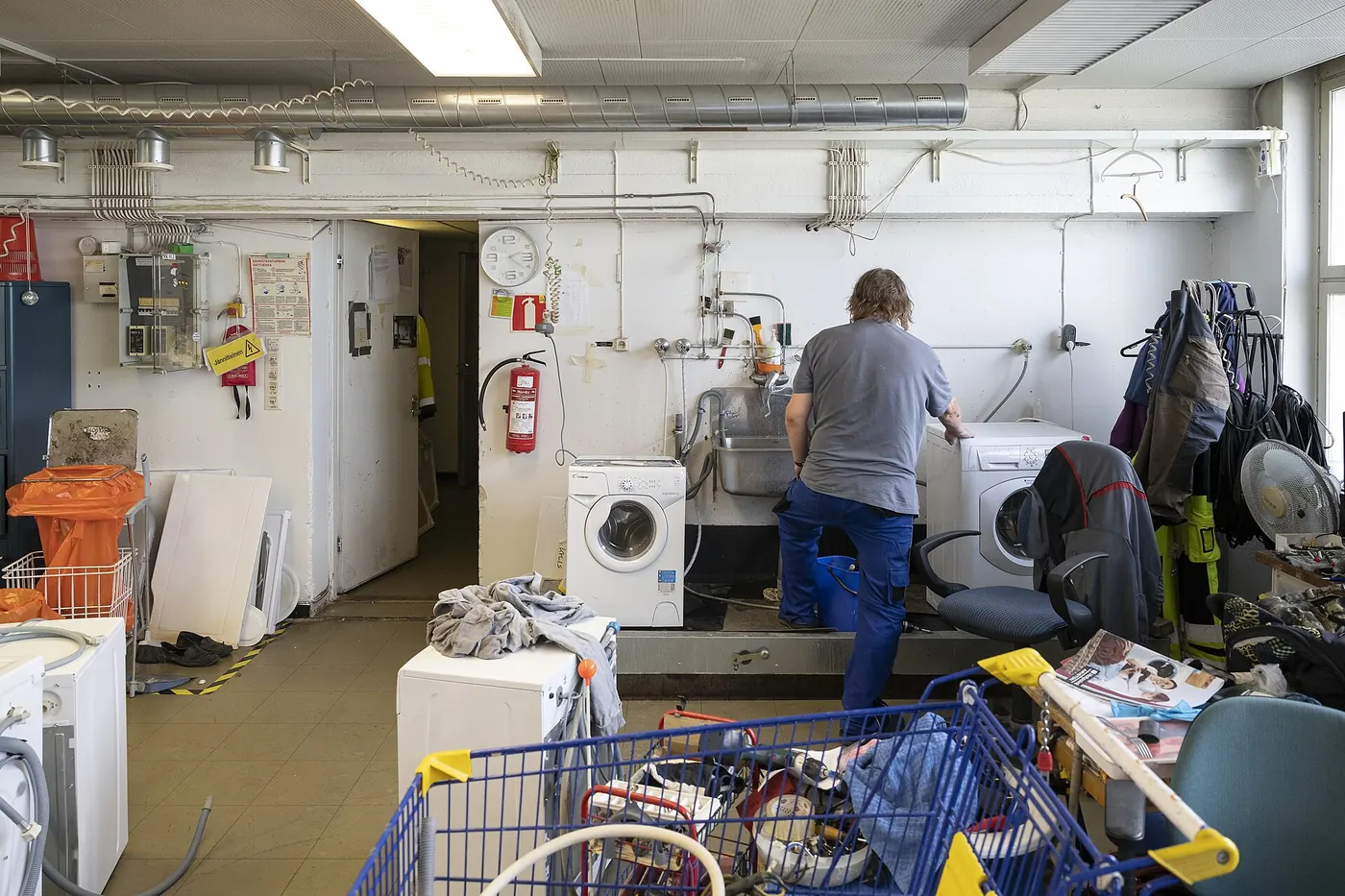 Technician servicing machines for reuse